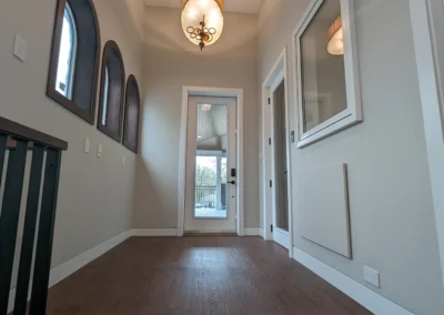 arched windows at elevator landing on second floor